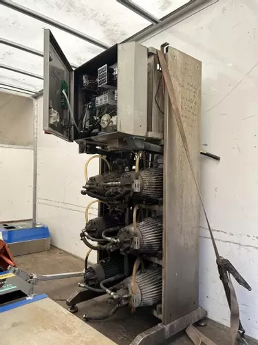 Delta booster pressure washer in worn condition before being fully reconditioned for installation at a factory in Measham.